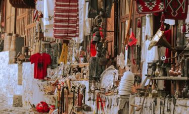 Explore the stone city of Kruja, Qeleshe making and Rakija tasting